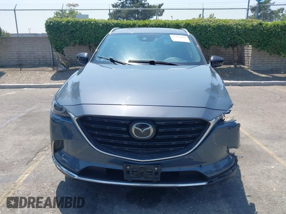 2022 Mazda CX-9 Grand Touring with VIN JM3TCBDY1N0611766, listed as a IAAI auction lot 42452059 with 60,755 mi miles and . Bid and sale history available at DreamBid. Image 12.