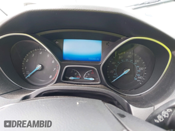2014 Ford Focus Titanium with VIN 1FADP3N25EL194433, listed as a IAAI auction lot 42512912 with 105,355 mi miles and . Bid and sale history available at DreamBid. Image 7.