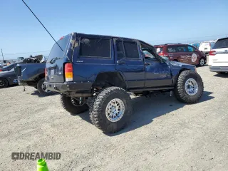 2000 Jeep Cherokee with VIN 1J4FF48S3YL126931, listed as a Copart auction lot 57593305 with Not provided miles and Non repairable. Bid and sale history available at DreamBid. Image 3.