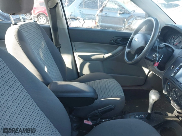 2007 Ford Focus S with VIN 1FAHP34N07W166828, listed as a IAAI auction lot 41992308 with 143,169 mi miles. Bid and sale history available at carsss.com. Image 5.