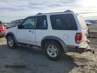1999 Ford Explorer Sport with VIN 1FMYU24X7XUC50909, listed as a Copart auction lot 50254305 with 83,605 mi miles and Salvage title. Bid and sale history available at DreamBid. Image 2.