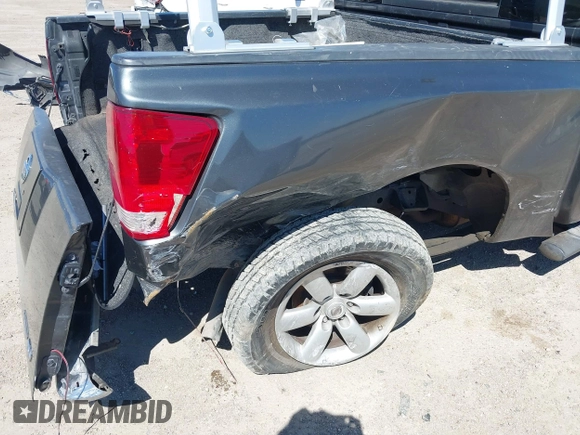 2012 Nissan Titan SV with VIN 1N6BA0ED2CN311628, listed as a IAAI auction lot 41729870 with 241,557 mi miles and . Bid and sale history available at DreamBid. Image 6.