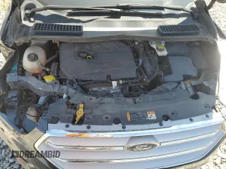 2018 Ford Escape SE z VIN 1FMCU9GD0JUA95941, wystawiony jako Copart lot #56606625 z przebiegiem 137 924 mil mil oraz Nie do naprawy • Non repairable. Historia ofert i sprzedaży dostępna na DreamBid. Obrazek 11.