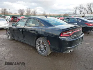 2019 Dodge Charger SXT with VIN 2C3CDXJG3KH630975, listed as a IAAI auction lot 41580174 with 74,575 mi miles and . Bid and sale history available at DreamBid. Image 3.