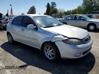 2006 Suzuki Reno z VIN KL5JD66Z36K455929, wystawiony jako Copart lot #49444974 z przebiegiem Nie podano mil oraz Szkody całkowita. Historia ofert i sprzedaży dostępna na DreamBid. Obrazek 4.