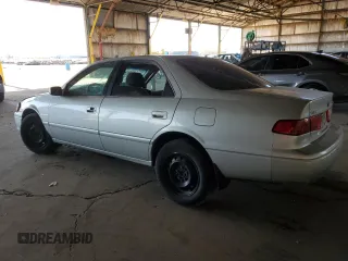 2001 Toyota Camry CE z VIN 4T1BG22K11U017054, wystawiony jako Copart lot #57623485 z przebiegiem 242 217 mil mil oraz Szkoda całkowita • Salvage title. Historia ofert i sprzedaży dostępna na DreamBid. Obrazek 2.
