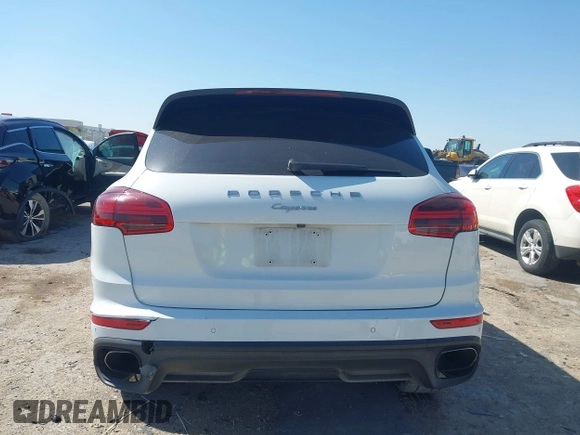 2016 Porsche Cayenne with VIN WP1AA2A29GLA04374, listed as a IAAI auction lot 41988374 with 144,716 mi miles. Bid and sale history available at carsss.com. Image 16.