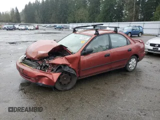 1997 Mazda Protege DX with VIN JM1BC1415V0146345, listed as a Copart auction lot 51526825 with 245,314 mi miles and Salvage Title. Bid and sale history available at DreamBid. Image 1.