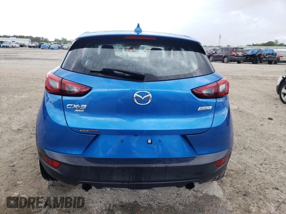 2016 Mazda CX-3 Grand Touring with VIN JM1DKBD72G0106104, listed as a Copart auction lot 52581085 with 76,603 mi miles and Salvage Title. Bid and sale history available at carsss.com. Image 6.
