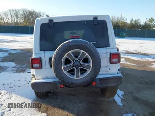 2021 Jeep Wrangler Unlimited Sahara with VIN 1C4HJXEG2MW827385, listed as a IAAI auction lot 41534476 with 29,489 mi miles and . Bid and sale history available at DreamBid. Image 16.