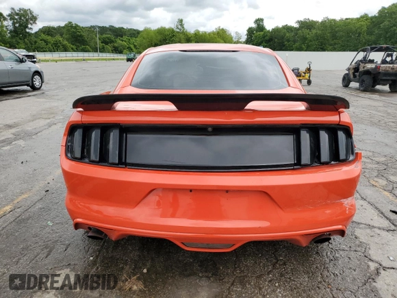 2015 Ford Mustang V6 z VIN 1FA6P8AM6F5388679, wystawiony jako Copart lot #58469525 z przebiegiem 69 819 mil mil oraz Szkoda całkowita • Salvage title. Historia ofert i sprzedaży dostępna na DreamBid. Obrazek 6.