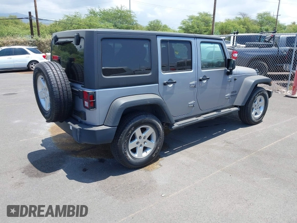 2016 Jeep Wrangler Unlimited Freedom with VIN 1C4BJWDG7GL109953, listed as a IAAI auction lot 42140111 with 24,570 mi miles and . Bid and sale history available at DreamBid. Image 4.