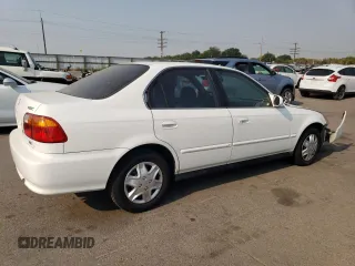 2000 Honda Civic EX with VIN JHMEJ864XYS001683, listed as a Copart auction lot 70066364 with 200,858 mi miles and Salvage Title. Bid and sale history available at carsss.com. Image 3.