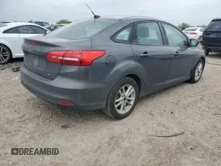 2018 Ford Focus SE z VIN 1FADP3F20JL223152, wystawiony jako Copart lot #51457695 z przebiegiem 118 240 mil mil oraz Czysty tytuł • Clean title. Historia ofert i sprzedaży dostępna na DreamBid. Obrazek 3.