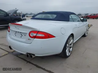 2014 Jaguar XK with VIN SAJWA4EC9EMB52042, listed as a IAAI auction lot 41635233 with 10,566 mi miles. Bid and sale history available at carsss.com. Image 4.
