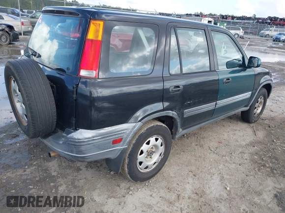 2000 Honda CR-V LX with VIN JHLRD2841YC012945, listed as a IAAI auction lot 41878294 with 306,110 mi miles. Bid and sale history available at carsss.com. Image 4.
