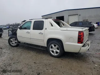 2013 Chevrolet Avalanche LTZ with VIN 3GNMCGE05DG142332, listed as a Copart auction lot 41986565 with 159,086 mi miles and Salvage Title. Bid and sale history available at carsss.com. Image 2.