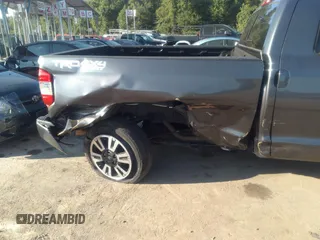 2018 Toyota Tundra SR z VIN 5TFUY5F19JX775462, wystawiony jako IAAI lot #34435962 z przebiegiem 44 563 mil mil oraz . Historia ofert i sprzedaży dostępna na DreamBid. Obrazek 6.