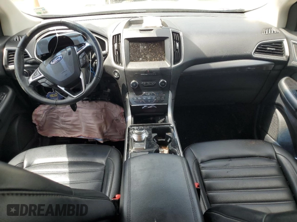 2020 Ford Edge SEL с VIN 2FMPK3J92LBA30123, выставлен на аукционе Copart как лот 63192805 с пробегом 119 534 миль миль и Списание • Salvage title. История ставок и продаж доступна на DreamBid. Изображение 8.