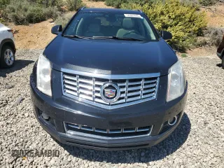 2013 Cadillac SRX Performance Collection z VIN 3GYFNHE37DS519391, wystawiony jako Copart lot #56307695 z przebiegiem 122 294 mil mil oraz Czysty tytuł • Clean title. Historia ofert i sprzedaży dostępna na DreamBid. Obrazek 5.