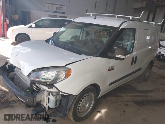 2019 Ram ProMaster City Cargo Tradesman z VIN ZFBHRFAB7K6M61484, wystawiony jako IAAI lot #41584872 z przebiegiem 63 558 mil mil oraz . Historia ofert i sprzedaży dostępna na DreamBid. Obrazek 2.