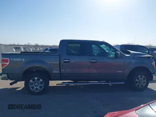 2013 Ford F-150 XL with VIN 1FTFW1ET5DKE02740, listed as a IAAI auction lot 41808135 with 185,304 mi miles. Bid and sale history available at carsss.com. Image 14.