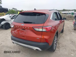2020 Ford Escape Titanium Hybrid with VIN 1FMCU0DZ1LUB13684, listed as a IAAI auction lot 41629782 with 31,669 mi miles and . Bid and sale history available at DreamBid. Image 4.