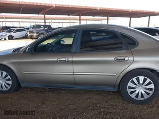 2002 Ford Taurus LX with VIN 1FAFP52U72G284116, listed as a IAAI auction lot 42004075 with 86,544 mi miles. Bid and sale history available at carsss.com. Image 14.