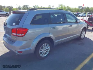 2015 Dodge Journey SXT with VIN 3C4PDCBG4FT656826, listed as a IAAI auction lot 41981425 with 131,847 mi miles. Bid and sale history available at carsss.com. Image 4.