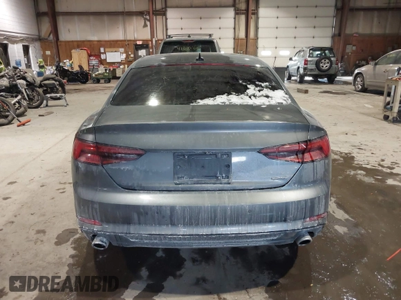 2018 Audi A5 Premium Plus with VIN WAUTNAF50JA011354, listed as a IAAI auction lot 41396659 with 74,936 mi miles and . Bid and sale history available at DreamBid. Image 16.
