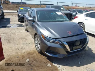 2022 Nissan Sentra S z VIN 3N1AB8BV8NY260166, wystawiony jako IAAI lot #42020733 z przebiegiem 26 913 mil mil oraz . Historia ofert i sprzedaży dostępna na DreamBid. Obrazek 1.