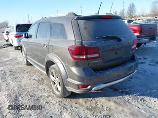 2016 Dodge Journey Crossroad Plus z VIN 3C4PDCGB0GT165975, wystawiony jako IAAI lot #41368904 z przebiegiem 101 835 mil mil oraz . Historia ofert i sprzedaży dostępna na DreamBid. Obrazek 3.