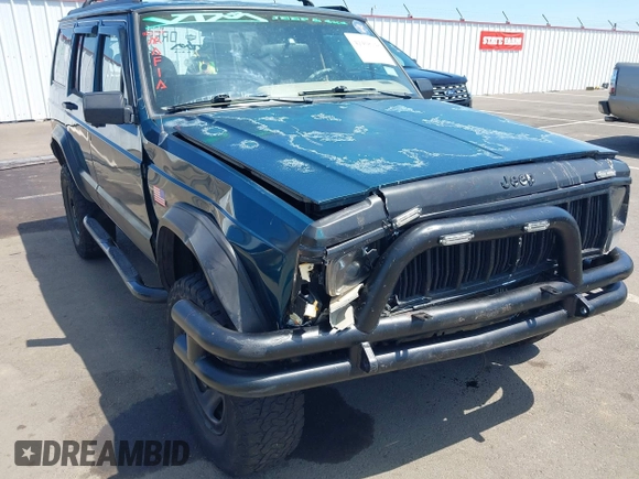 1995 Jeep Cherokee Sport with VIN 1J4FJ68S7SL631078, listed as a IAAI auction lot 42408148 with 190,765 mi miles and . Bid and sale history available at DreamBid. Image 6.