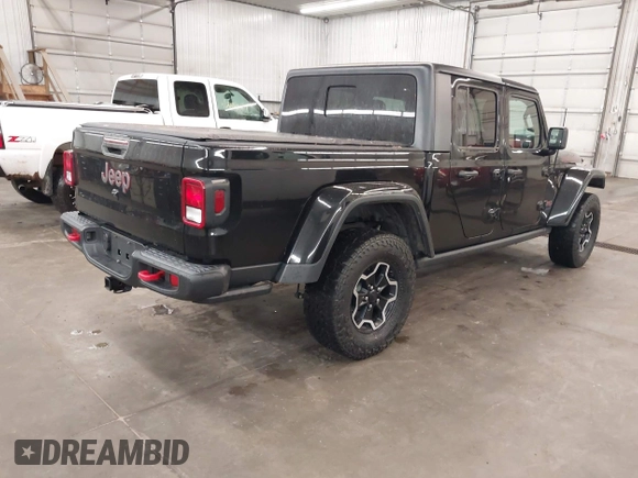 2021 Jeep Gladiator Rubicon with VIN 1C6JJTBGXML529108, listed as a IAAI auction lot 42139924 with 32,204 mi miles and . Bid and sale history available at DreamBid. Image 4.