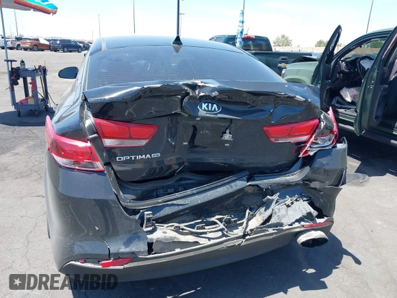 2020 Kia Optima LX with VIN 5XXGT4L32LG420025, listed as a IAAI auction lot 42288132 with 69,729 mi miles and . Bid and sale history available at DreamBid. Image 6.
