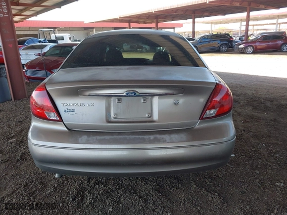 2002 Ford Taurus LX with VIN 1FAFP52U72G284116, listed as a IAAI auction lot 42004075 with 86,544 mi miles. Bid and sale history available at carsss.com. Image 16.