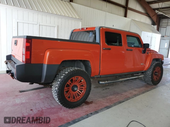 2009 Hummer H3 with VIN 5GNEN13E998144228, listed as a Copart auction lot 70231814 with 119,203 mi miles and Clean Title. Bid and sale history available at DreamBid. Image 3.