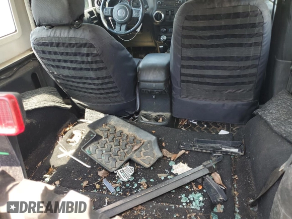 2017 Jeep Wrangler Rubicon with VIN 1C4BJWCG0HL675472, listed as a Copart auction lot 62751365 with 86,338 mi miles and Salvage title. Bid and sale history available at DreamBid. Image 11.