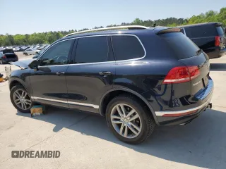 2015 Volkswagen Touareg Lux z VIN WVGEP9BP2FD006802, wystawiony jako Copart lot #52291965 z przebiegiem 122 787 mil mil oraz Szkoda całkowita • Salvage title. Historia ofert i sprzedaży dostępna na DreamBid. Obrazek 2.