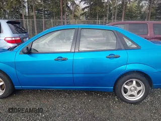 2007 Ford Focus S with VIN 1FAHP34N27W161713, listed as a IAAI auction lot 41966335 with 154,007 mi miles and . Bid and sale history available at carsss.com. Image 14.