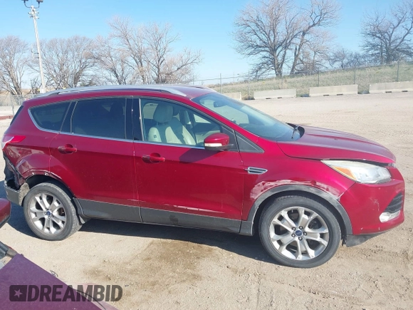 2014 Ford Escape Titanium with VIN 1FMCU9J98EUC24857, listed as a IAAI auction lot 41973037 with 160,634 mi miles. Bid and sale history available at carsss.com. Image 14.