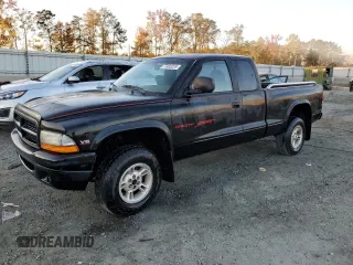 1999 Dodge Dakota SLT with VIN 1B7GG22X1XS235134, listed as a Copart auction lot 77482224 with 172,701 mi miles and Salvage Title. Bid and sale history available at carsss.com. Image 1.
