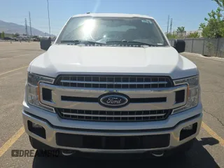 2018 Ford F-150 XL with VIN 1FTEW1E59JKD11351, listed as a IAAI auction lot 42663848 with 128,761 mi miles and . Bid and sale history available at DreamBid. Image 26.