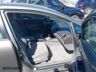 2006 Honda Civic Sdn LX with VIN 1HGFA16516L060197, listed as a IAAI auction lot 41855242 with 204,499 mi miles. Bid and sale history available at carsss.com. Image 5.