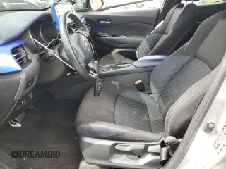 2020 Toyota C-HR LE with VIN JTNKHMBX7L1065098, listed as a Copart auction lot 50101395 with 51,933 mi miles and Salvage Title. Bid and sale history available at DreamBid. Image 7.