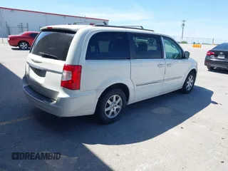 2013 Chrysler Town & Country Touring with VIN 2C4RC1BG0DR585138, listed as a IAAI auction lot 42186087 with 205,152 mi miles and . Bid and sale history available at DreamBid. Image 4.
