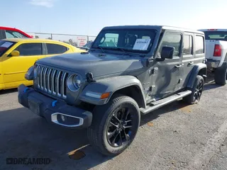 2023 Jeep Wrangler 4xe Sahara with VIN 1C4JJXP68PW661190, listed as a IAAI auction lot 41816483 with 41,877 mi miles. Bid and sale history available at carsss.com. Image 17.