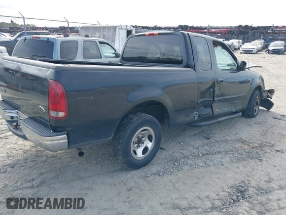 2003 Ford F-150 XL with VIN 1FTRX17W53NB19575, listed as a IAAI auction lot 41711599 with 1 mi miles. Bid and sale history available at carsss.com. Image 4.