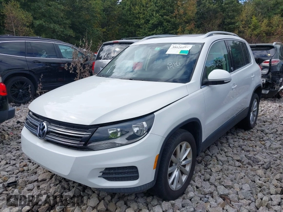 2017 Volkswagen Tiguan Wolfsburg Edition with VIN WVGRV7AX1HW505773, listed as a IAAI auction lot 38026893 with 63,026 mi miles and . Bid and sale history available at DreamBid. Image 2.