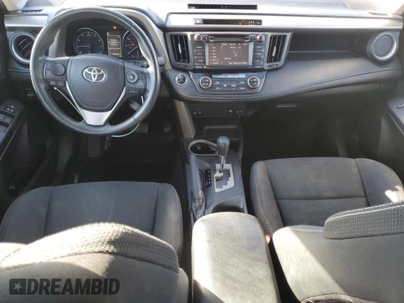 2018 Toyota RAV4 XLE with VIN 2T3WFREV2JW454202, listed as a Copart auction lot 41599855 with 144,442 mi miles and Salvage title. Bid and sale history available at DreamBid. Image 8.